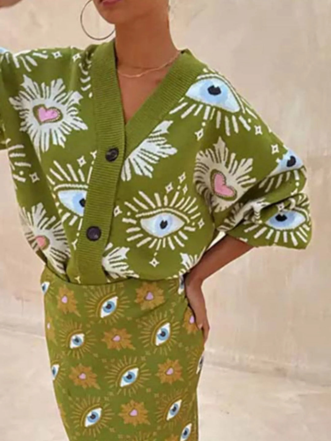 Evil eye print dropped shoulder button-down knit cardigan