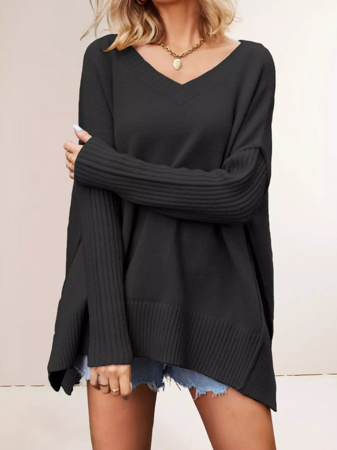 Black Oversized ribbed-sleeve V-neck tunic sweater with side slits