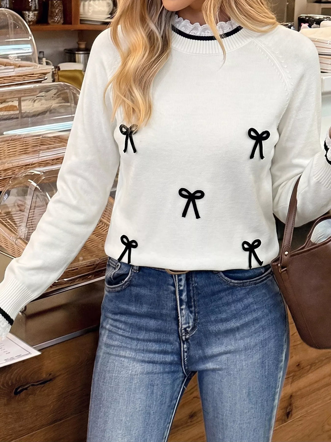 Lace trim mock neck sweater with contrast bow appliqués
