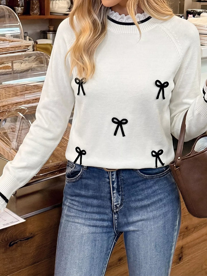 Lace trim mock neck sweater with contrast bow appliqués