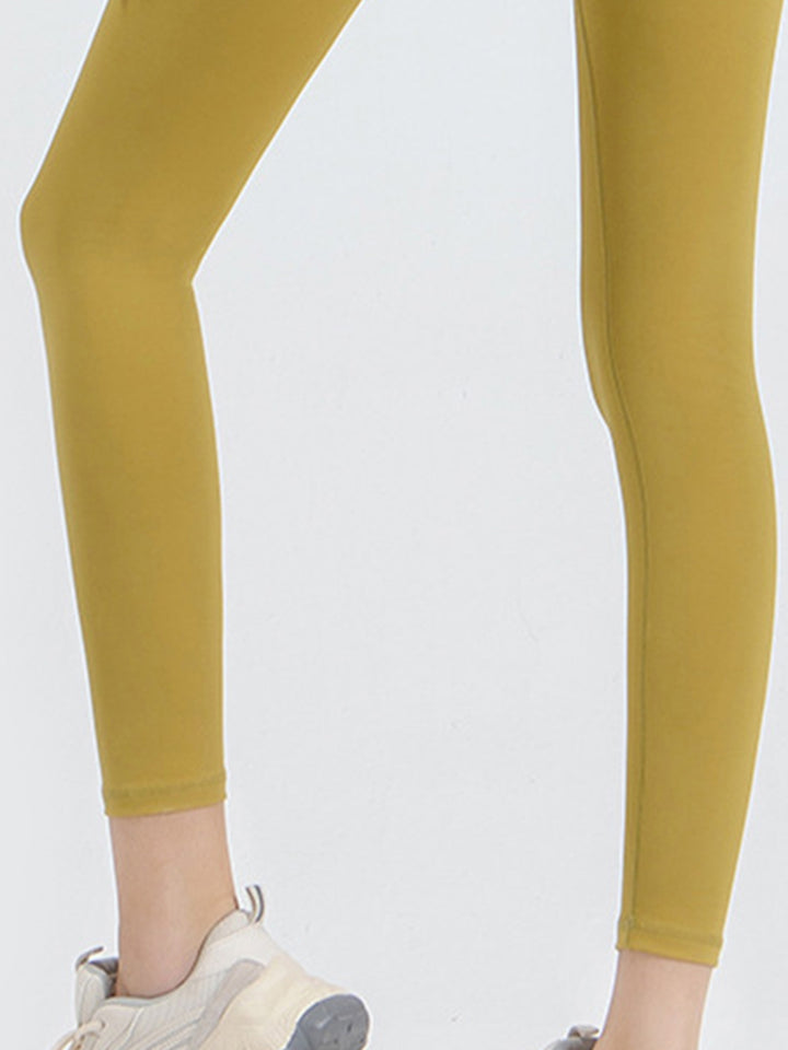 High-rise sports leggings with wide yoke waistband
