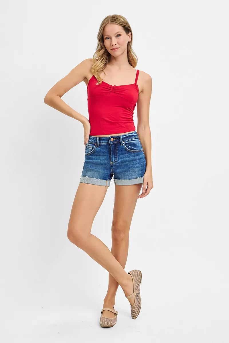 Cuffed low-rise denim shorts with raw hem detail