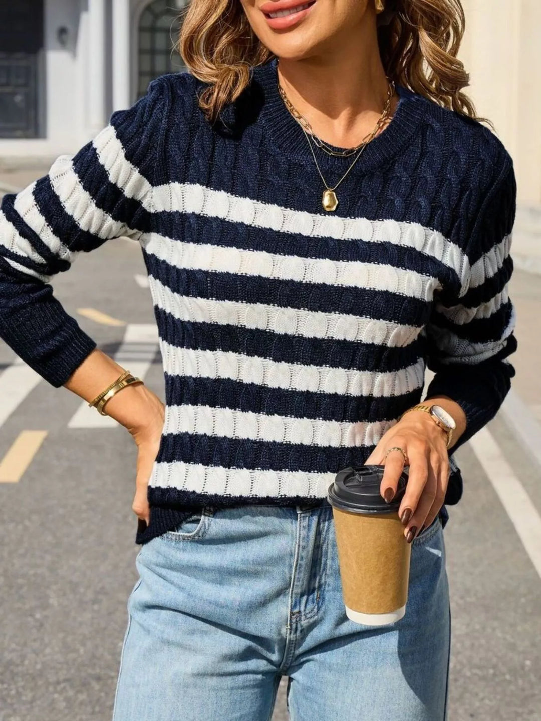 Striped cable knit sweater with ribbed crew neck