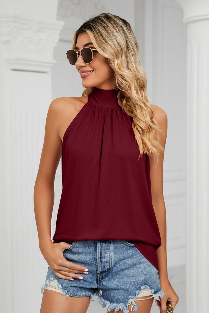 Gathered mock neck sleeveless top with relaxed swing fit