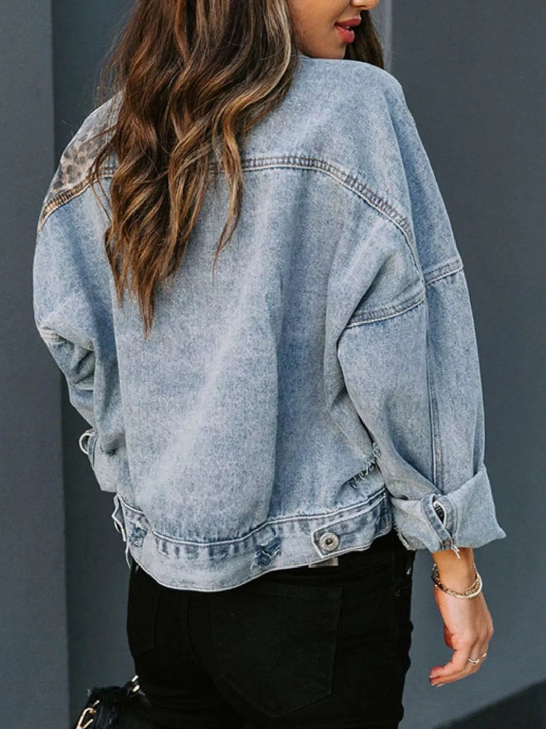 Distressed leopard-panel button-up denim jacket