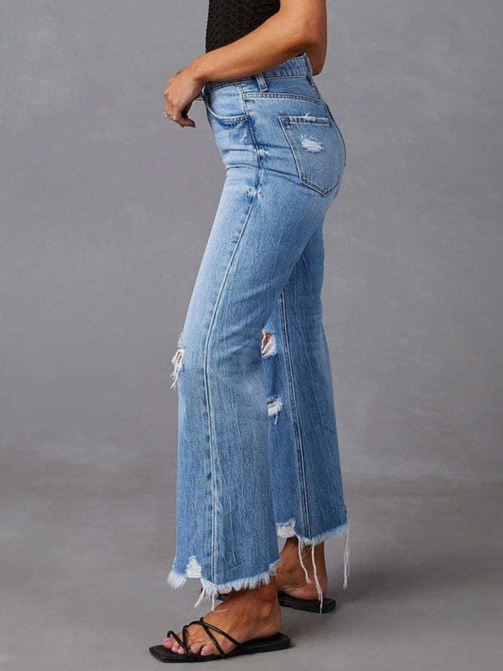 High-rise distressed flare jeans with frayed raw hem