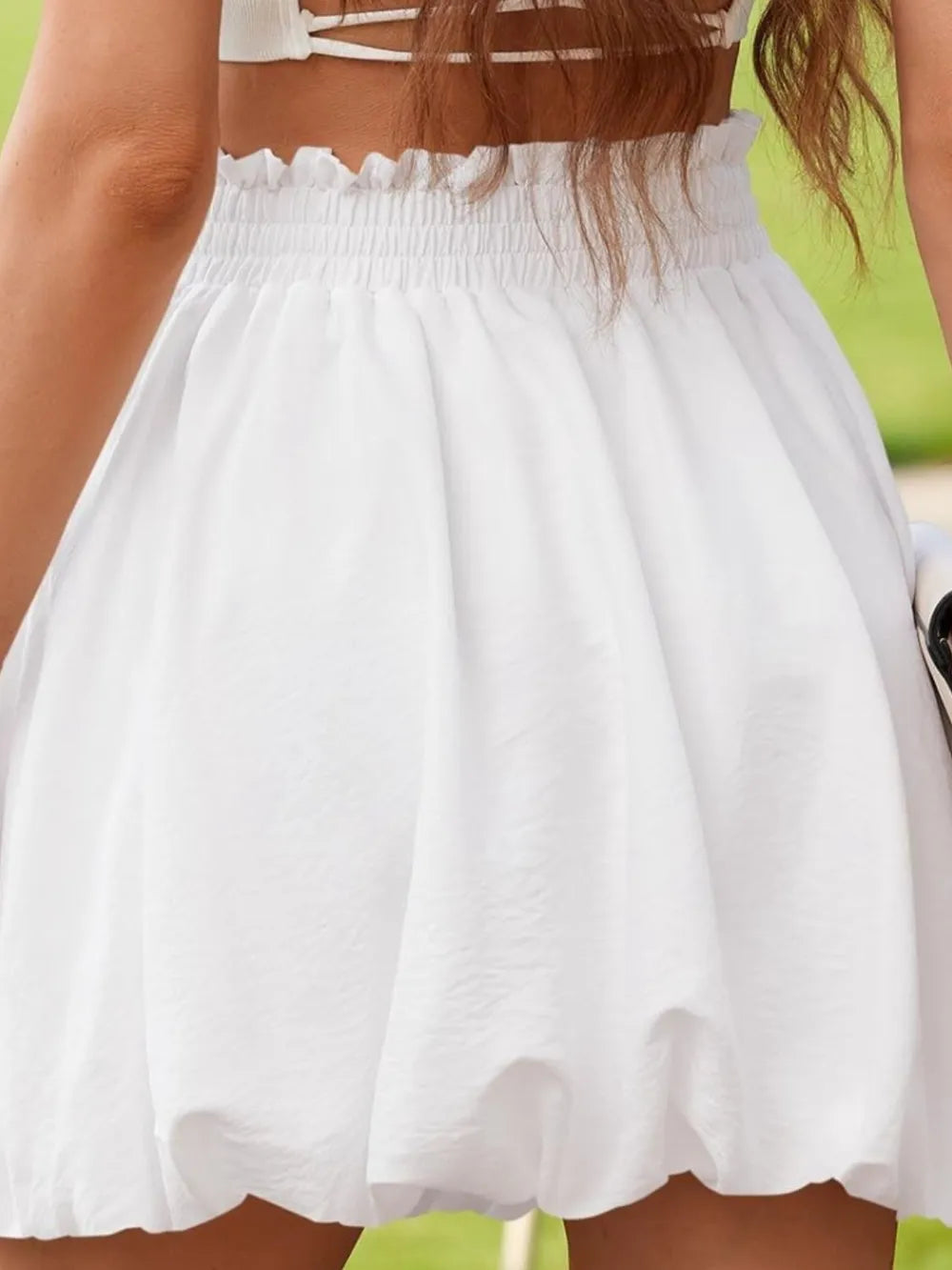 Bubble hem mini skirt with smocked waistband