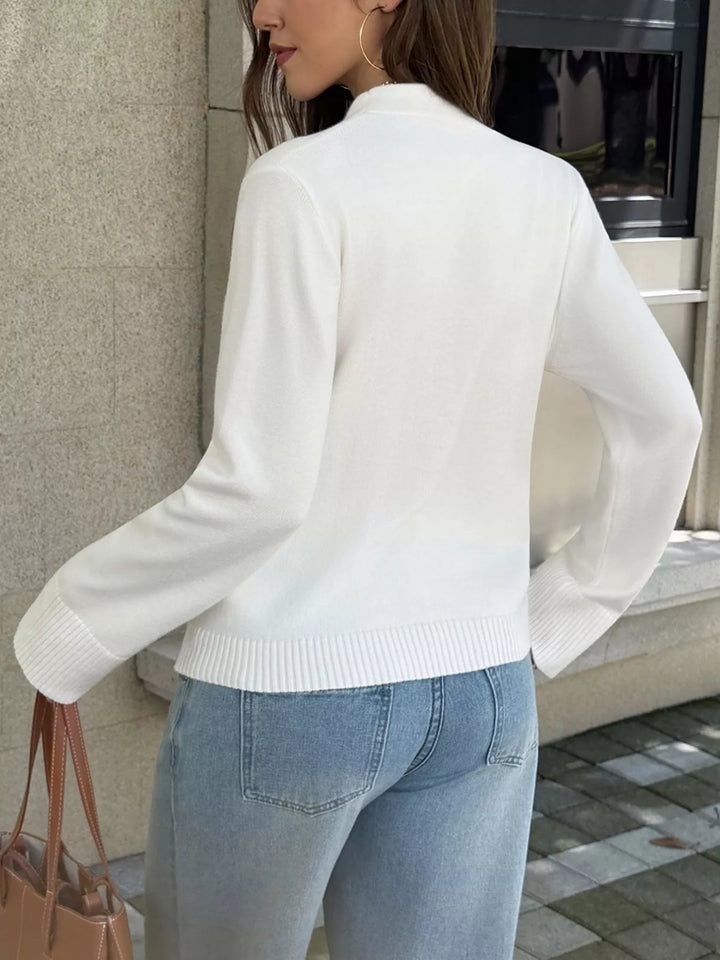 Deep V-neck button-front knit cardigan with patch pockets