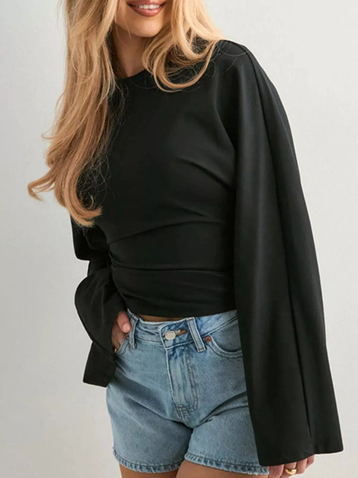 Fitted long sleeve top with flared bell sleeves
