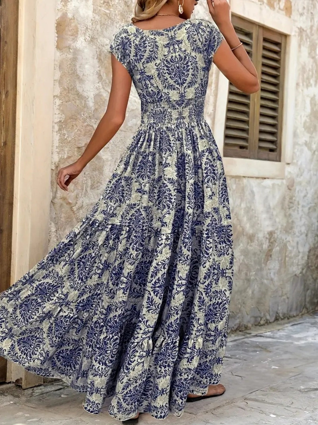 Smocked tiered maxi dress with cap sleeves and side slit