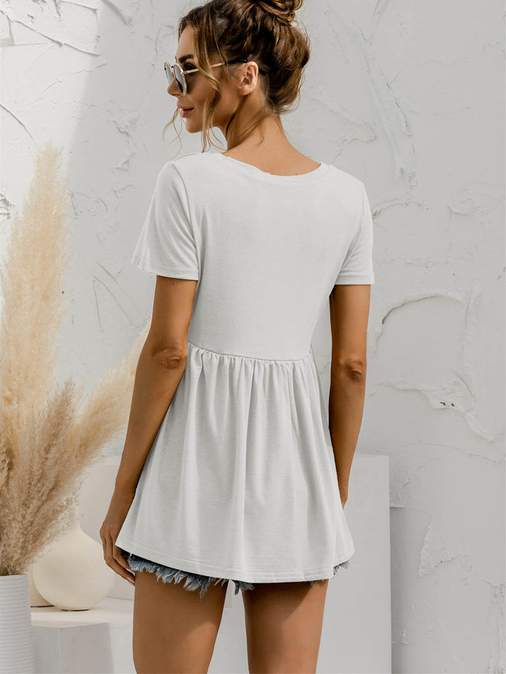 V-neck babydoll top with short sleeves and empire waist