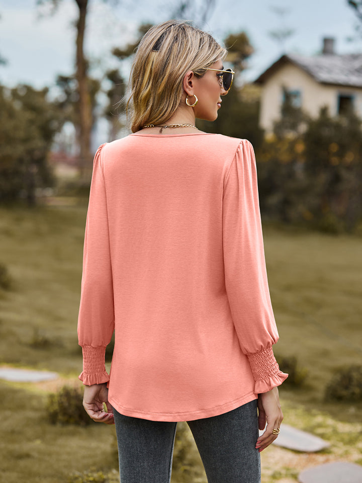 Pintuck pleated puff sleeve blouse with smocked cuffs