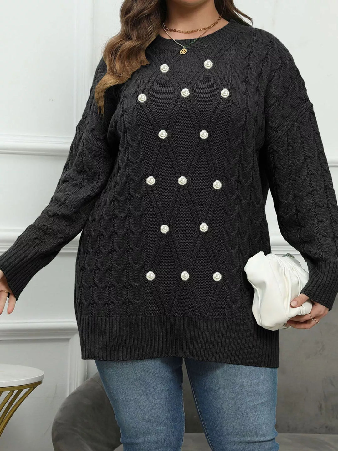Cable knit dropped shoulder sweater with floral buttons