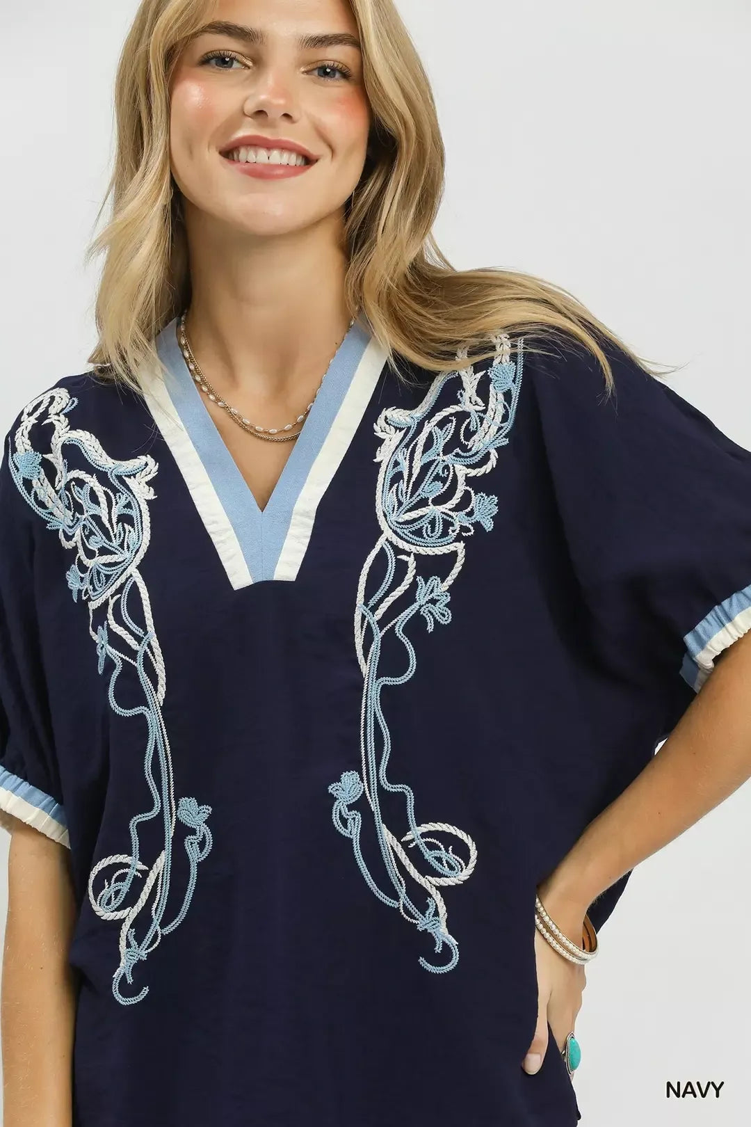 Embroidered floral V-neck boxy blouse with contrast trim