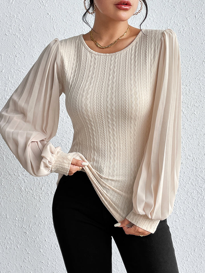 Cream Textured knit blouse with puff sleeves and round neck