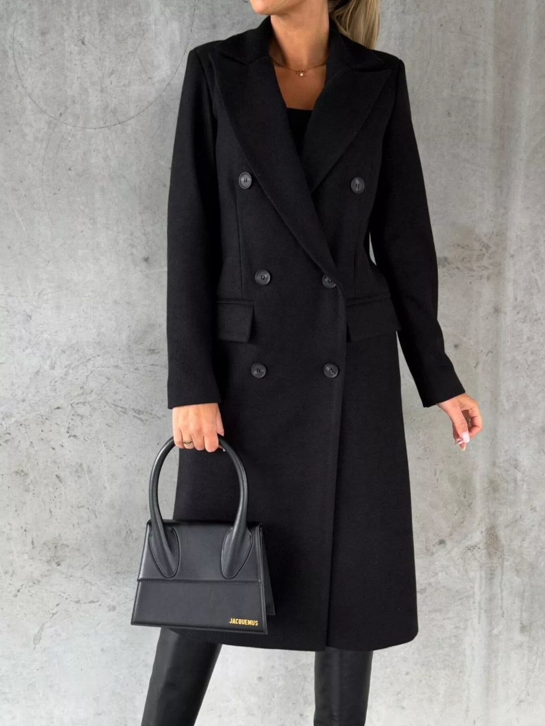 Black Double-breasted longline coat with notch lapel and flap pockets