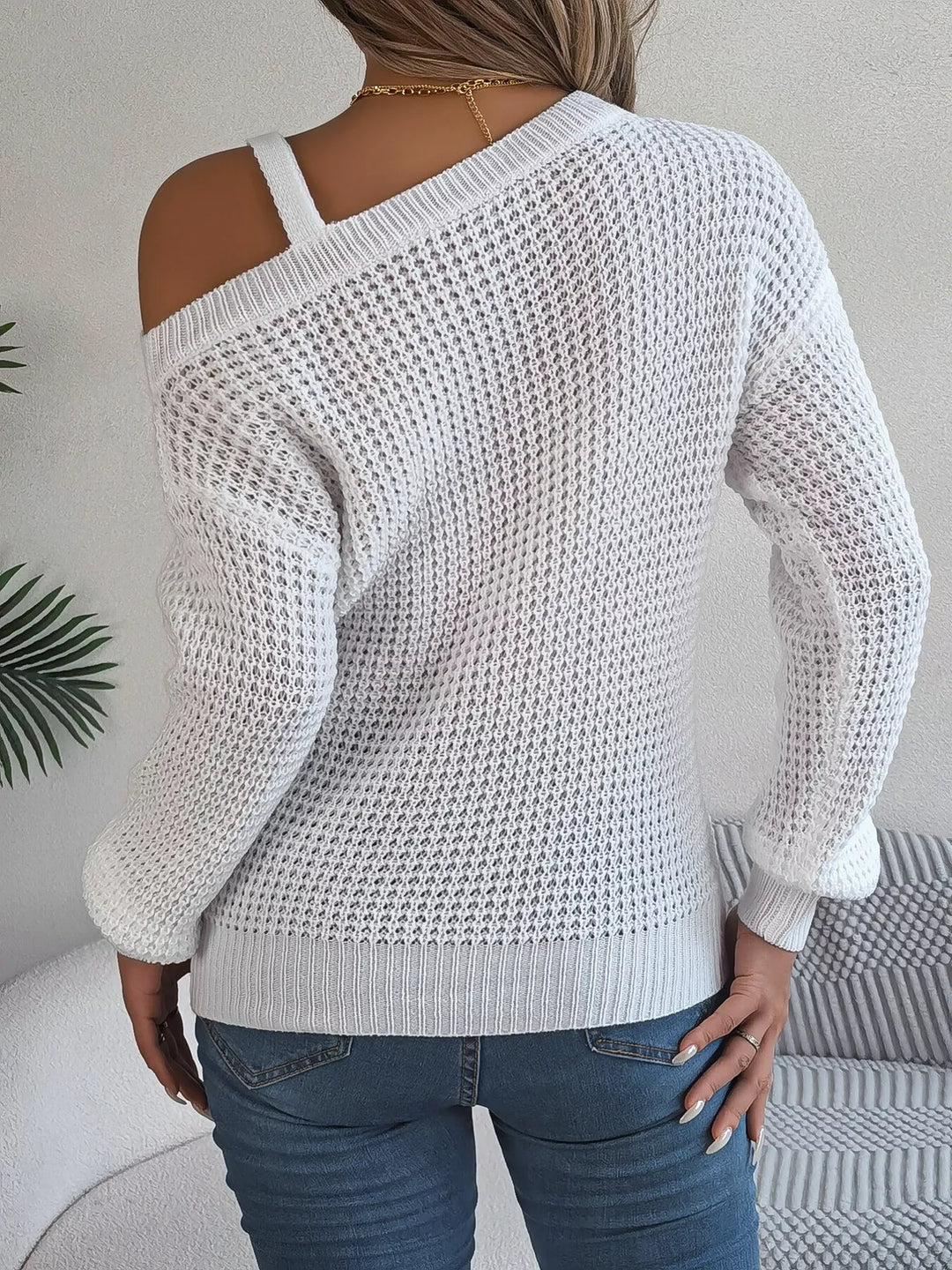 Asymmetrical cold-shoulder openwork knit sweater with chain strap