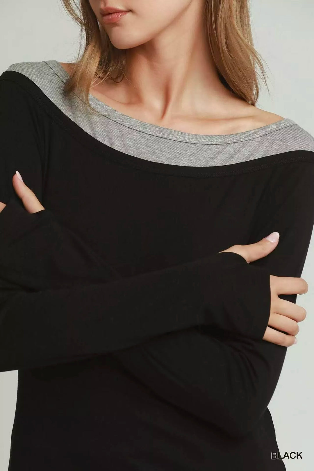 Twofer layered long sleeve top with contrast trim and thumbholes