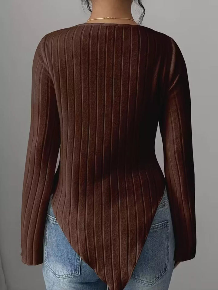 Ribbed knit top with asymmetric hem and flared sleeves