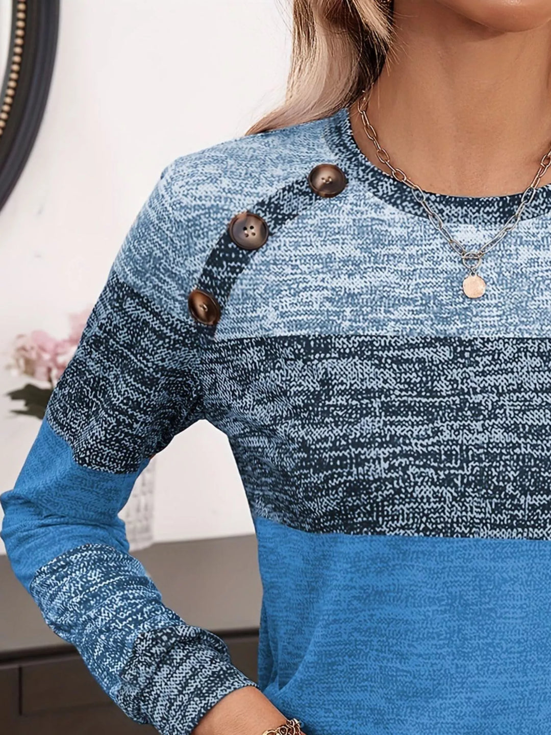 Color block long sleeve top with button shoulders