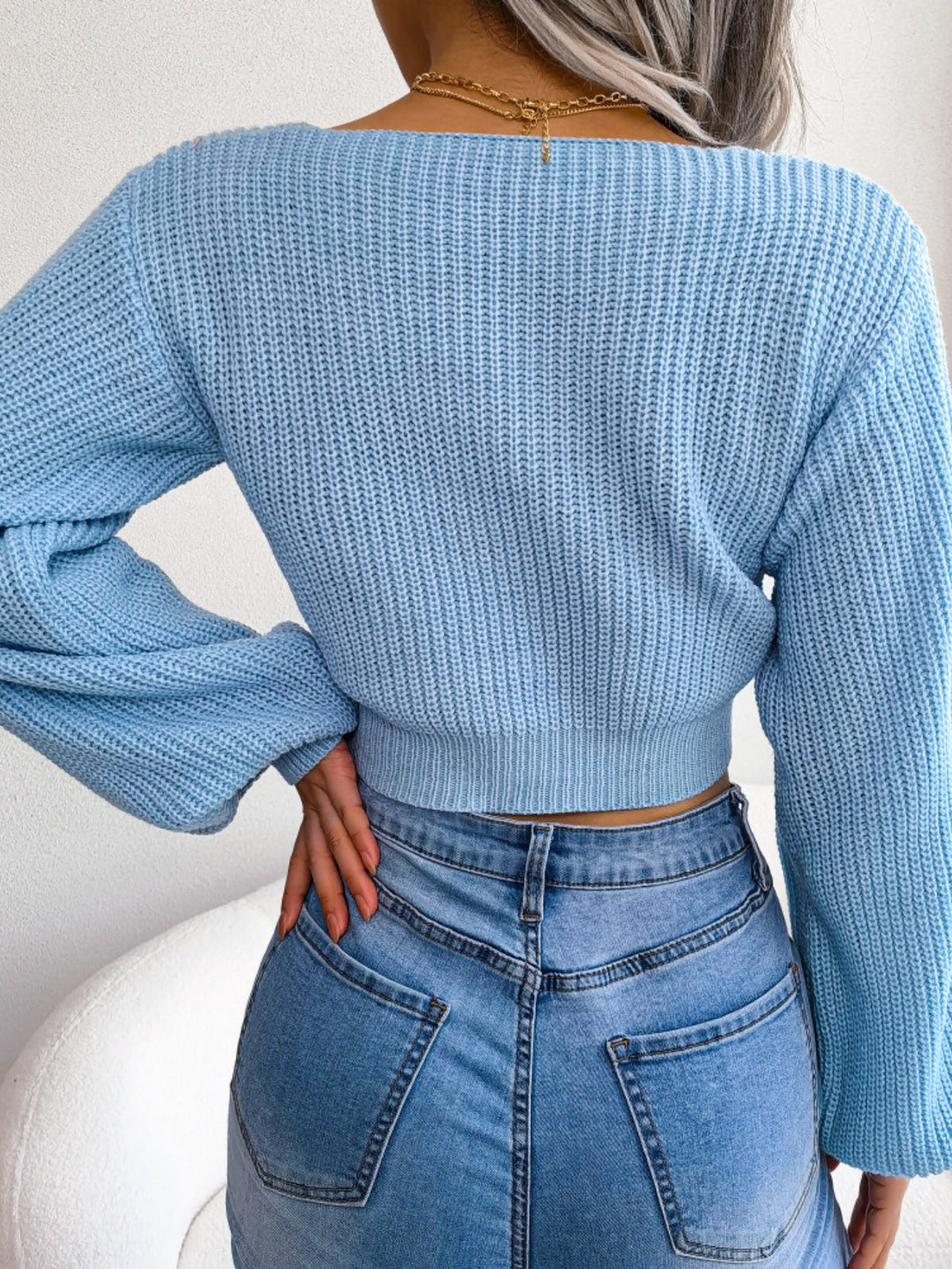 Light Blue Tie-front ribbed knit cropped sweater with deep V-neck