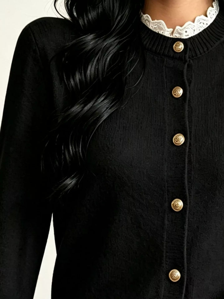 Lace trim crew neck sweater with buttoned ribbed cuffs