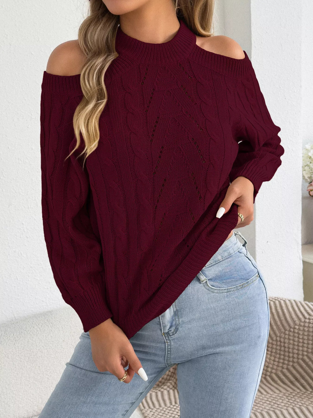 Cold shoulder cable knit mock neck sweater