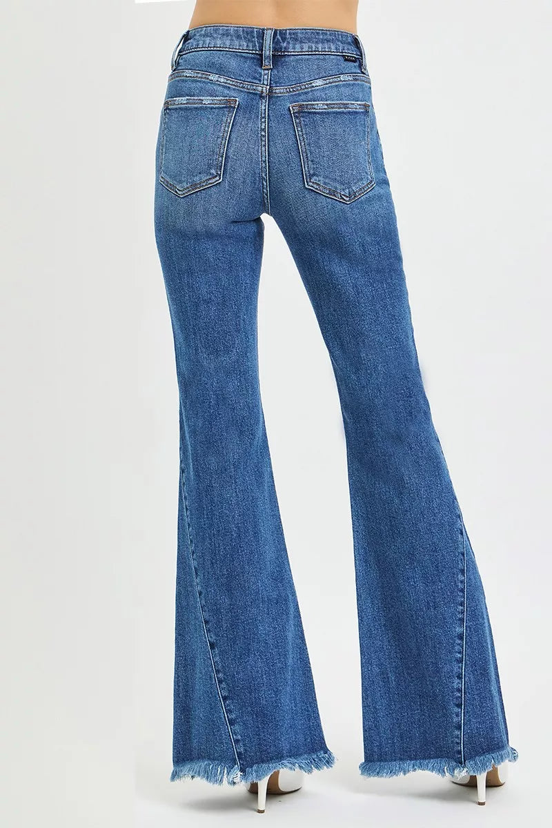 Mid-rise flare jeans with paneled side seams and raw hem