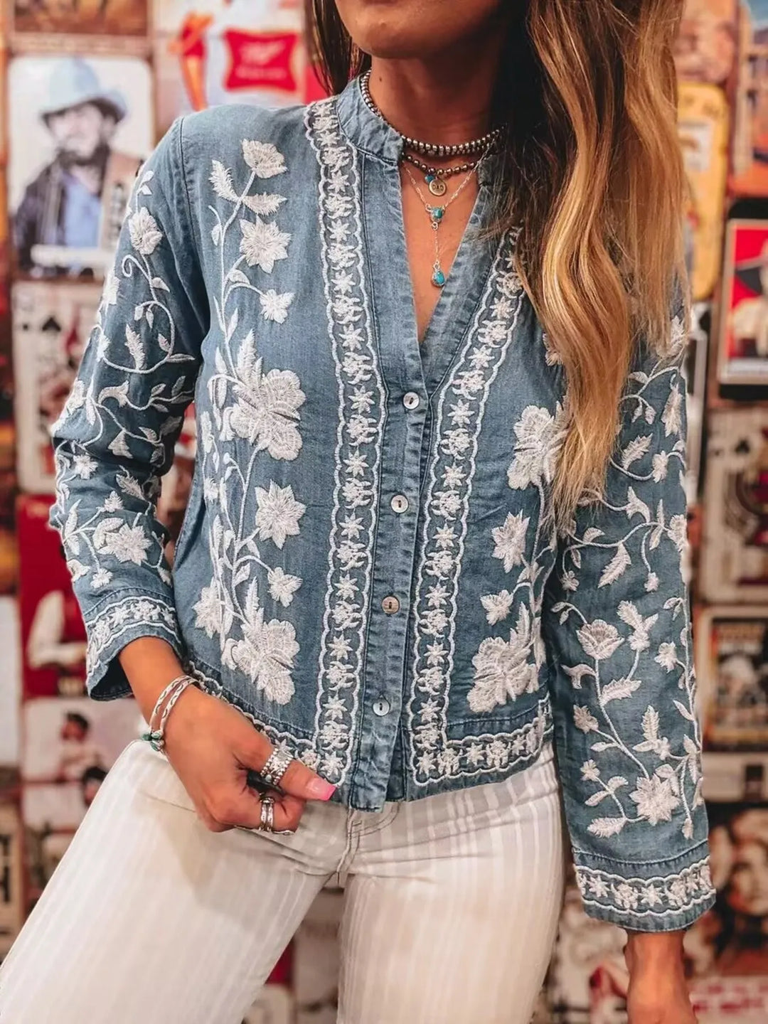 Floral embroidered button-up denim shirt
