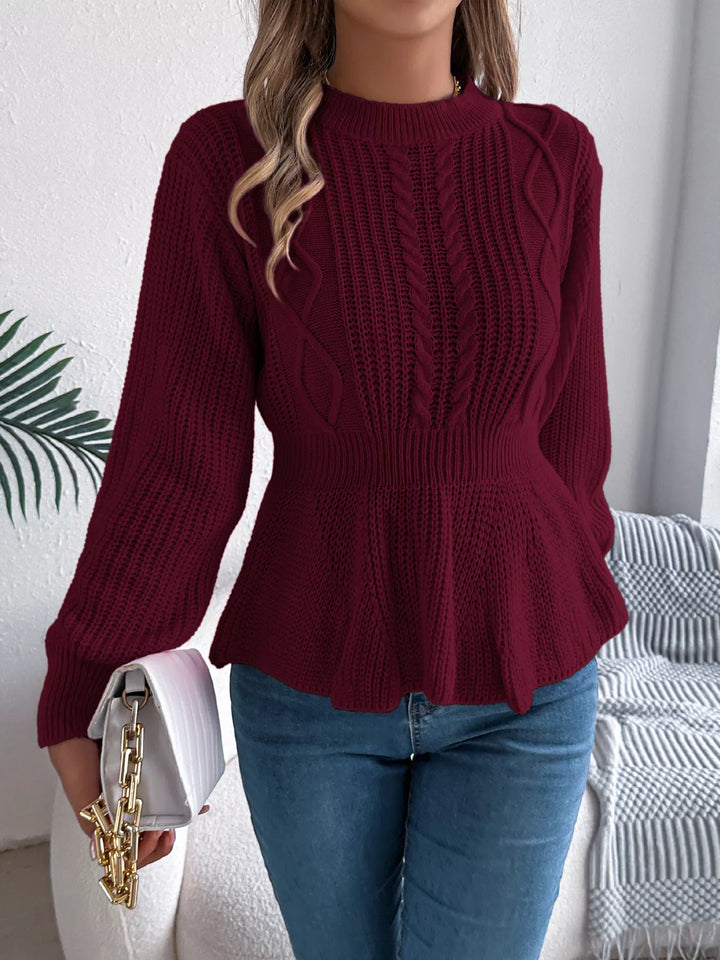 Cable knit peplum sweater with mock neck