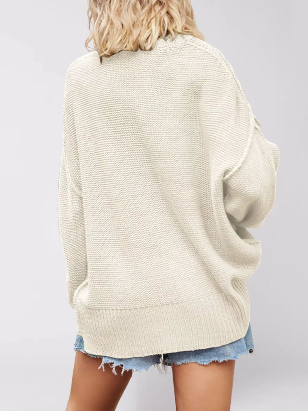 Apricot Drop shoulder V-neck sweater with exposed seams