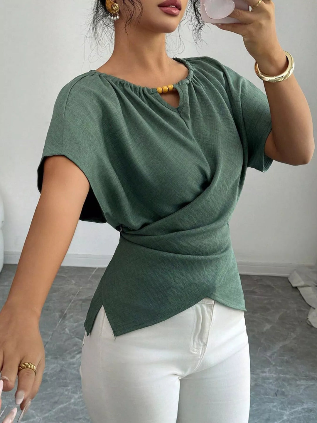 Wrap-front short sleeve blouse with beaded keyhole neckline