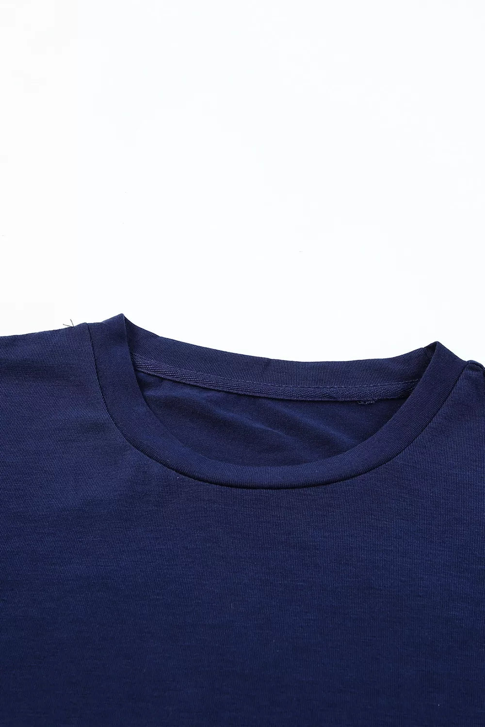 Rolled-sleeve crew neck tee with curved hem
