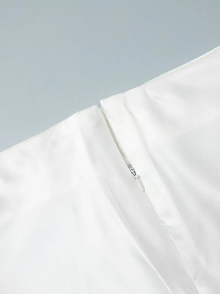 Fitted high-waist satin maxi skirt with flared hem