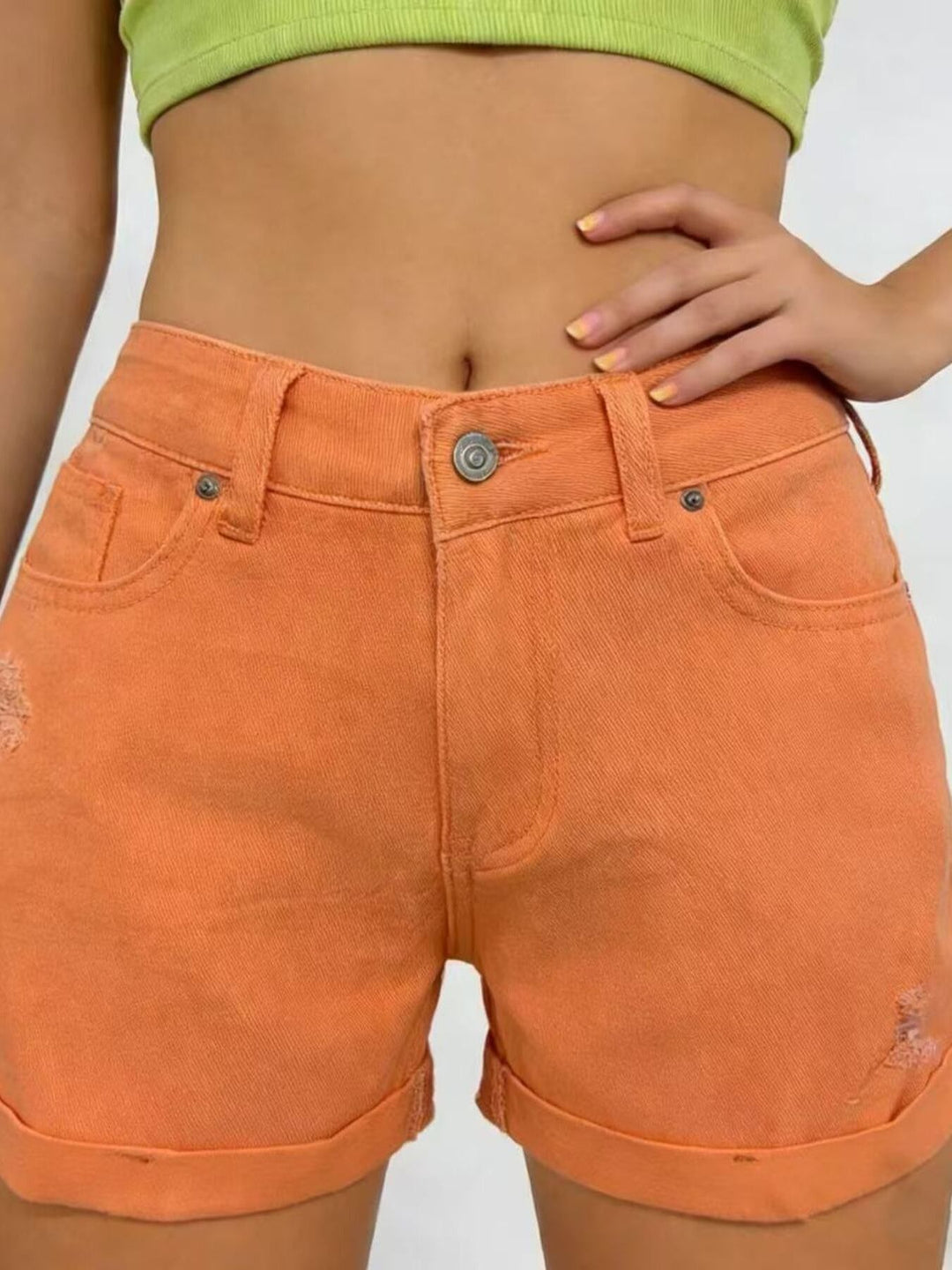 Orange-red High-rise distressed denim shorts with cuffed hem