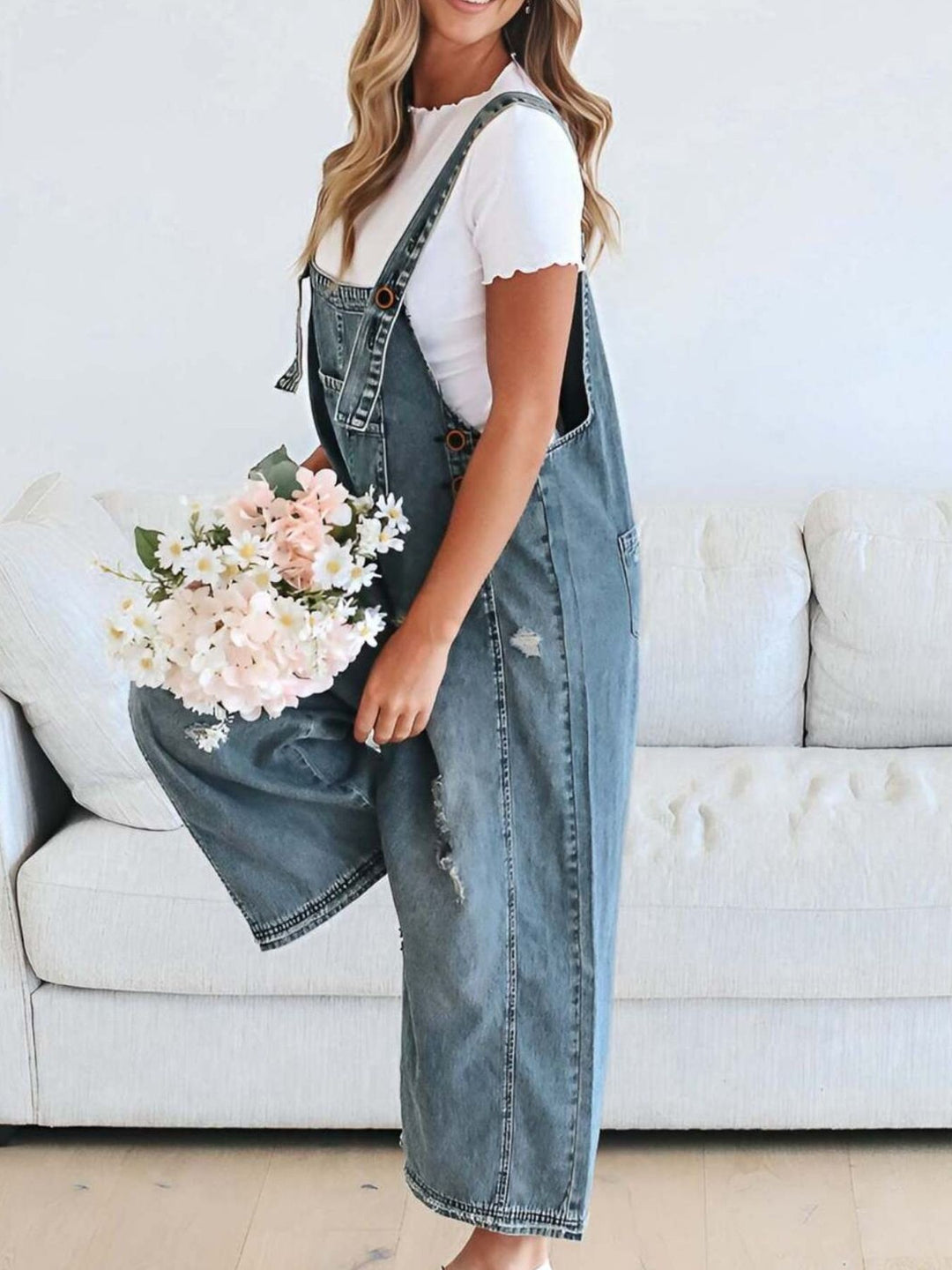 Distressed wide leg denim overalls with adjustable straps