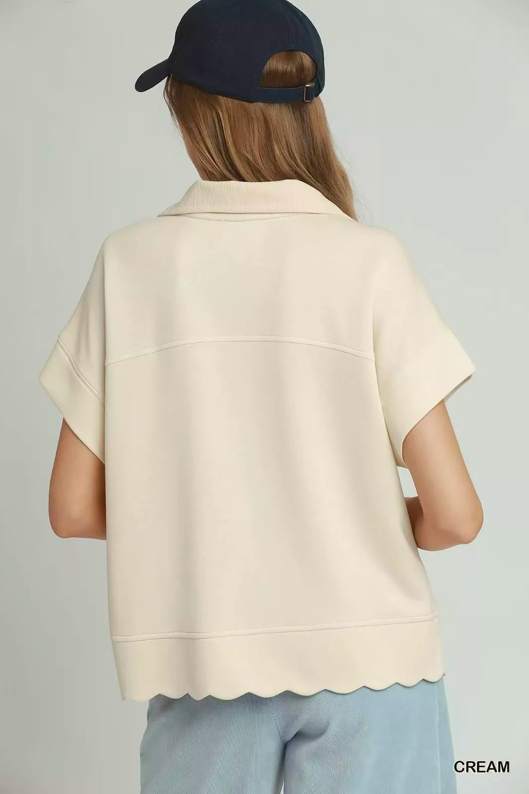 Scalloped hem half-zip short sleeve knit pullover