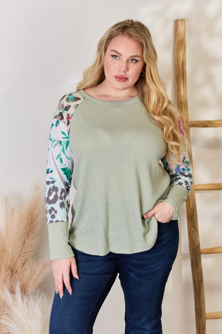 Waffle knit top with floral and leopard print sleeves