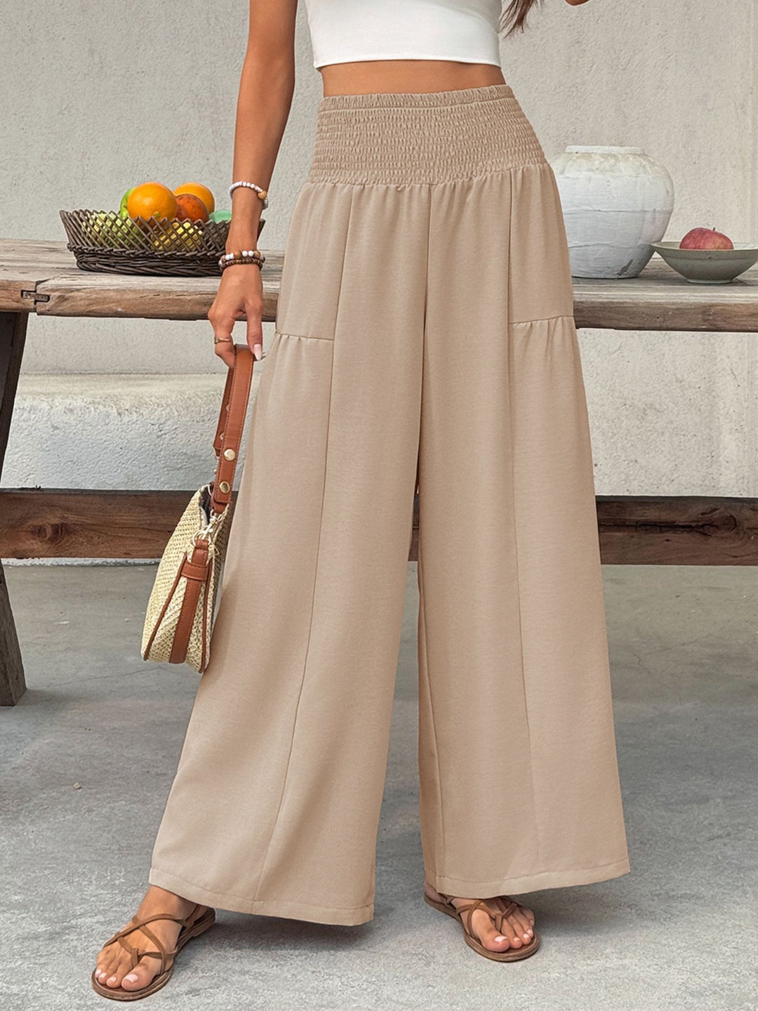 Smocked high-waist wide-leg cotton pants with pockets