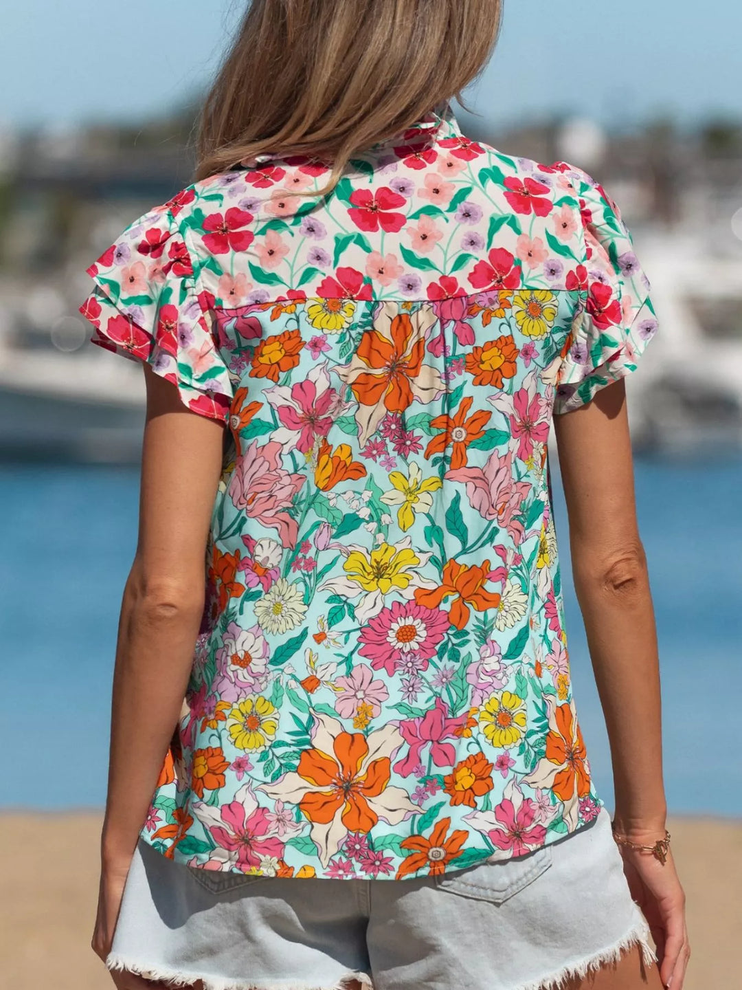 Floral flutter sleeve split-neck button-front blouse