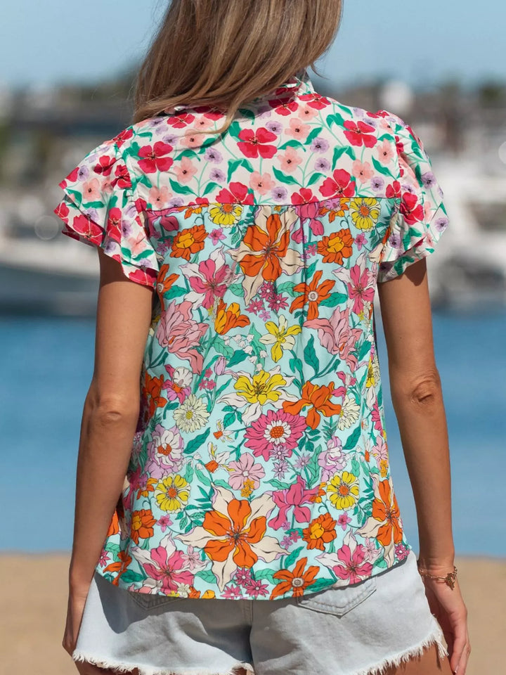 Floral flutter sleeve split-neck button-front blouse
