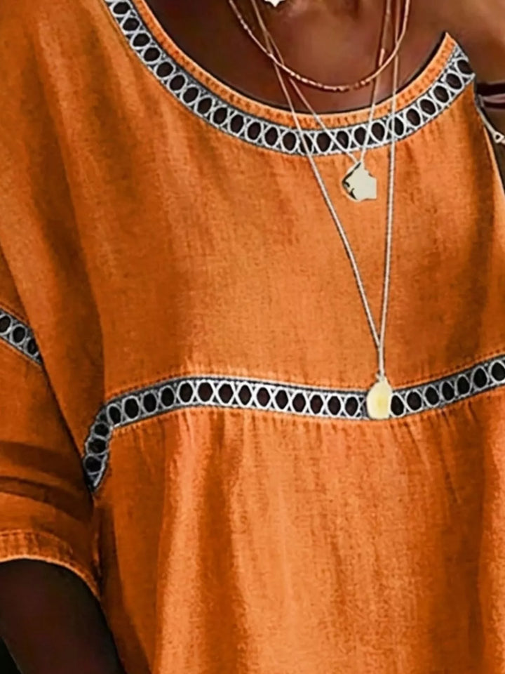 Floral print crochet-trim tunic top with 3/4 sleeves