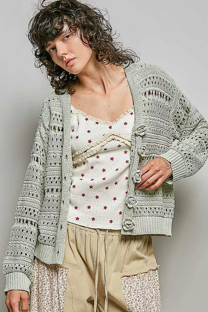 Open-knit V-neck cardigan with 3D floral buttons