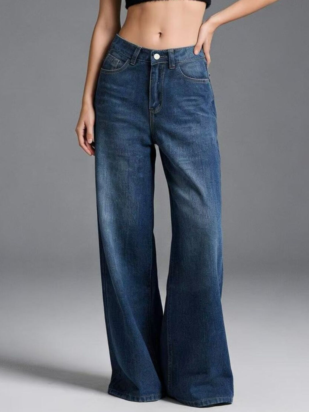 High-rise wide-leg jeans with whiskered fading