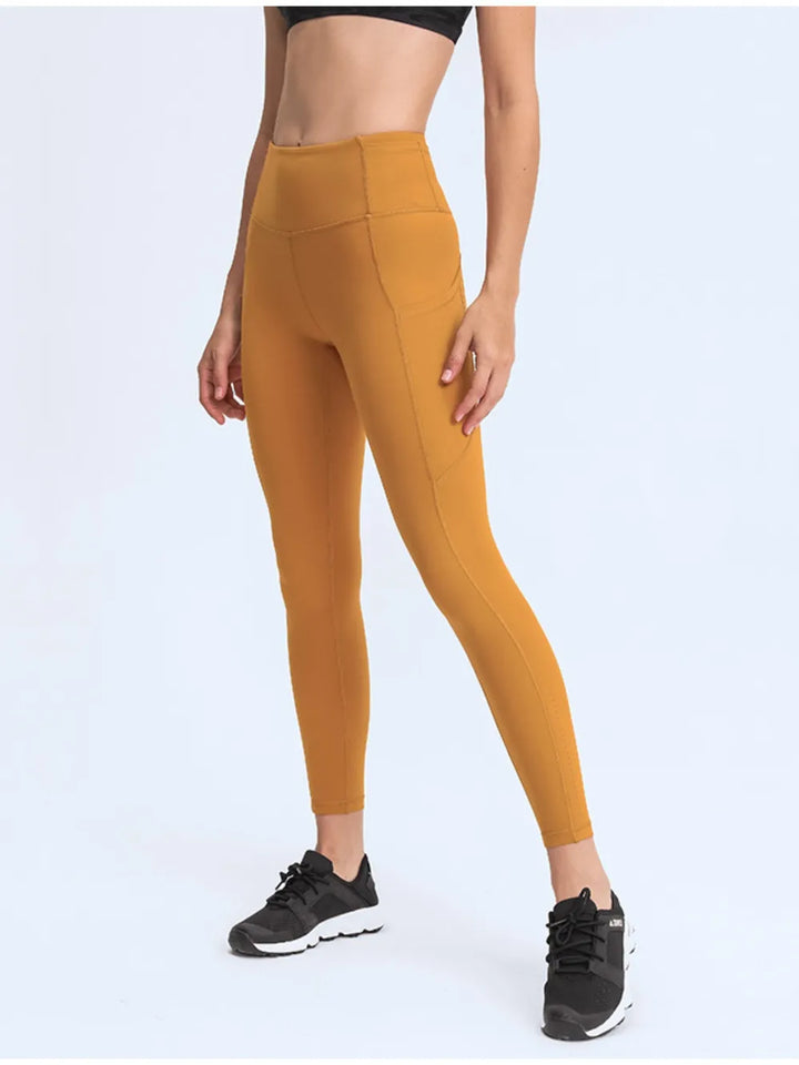 Tangerine Wide waistband high-rise leggings with side pockets