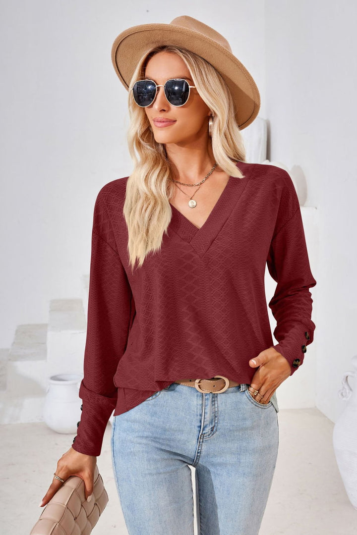 Burgundy Textured knit V-neck long sleeve top with button cuffs