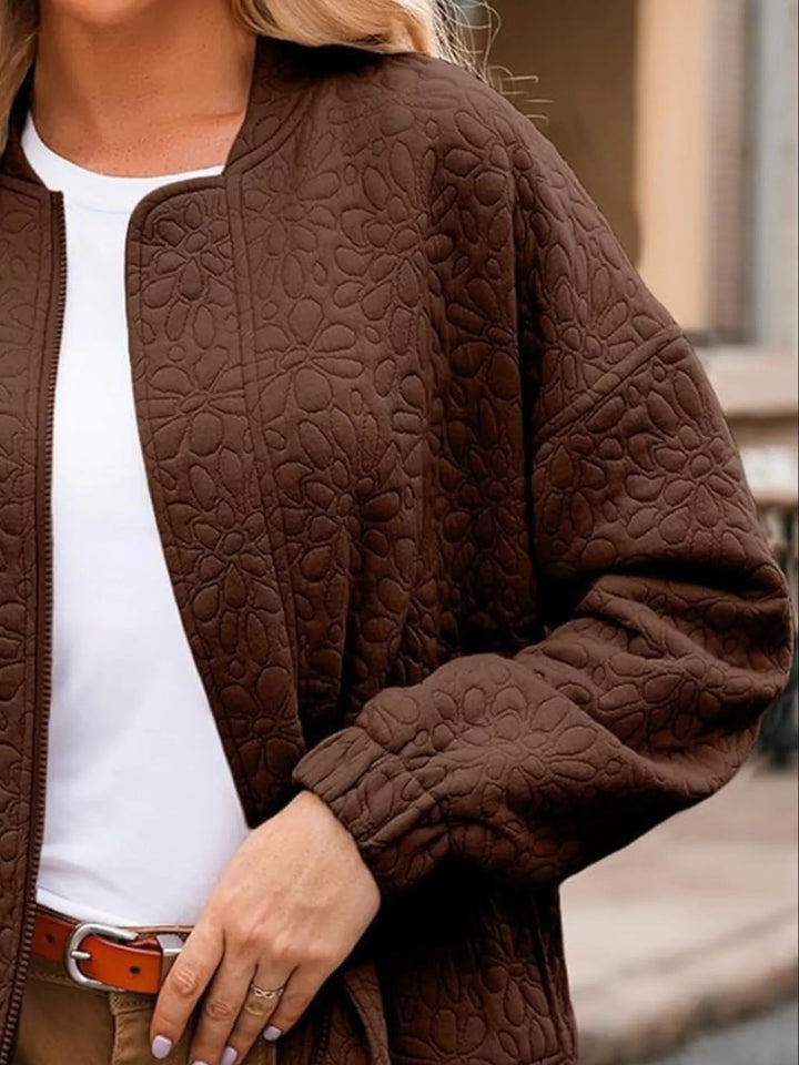Floral quilted zip-up bomber jacket with pockets