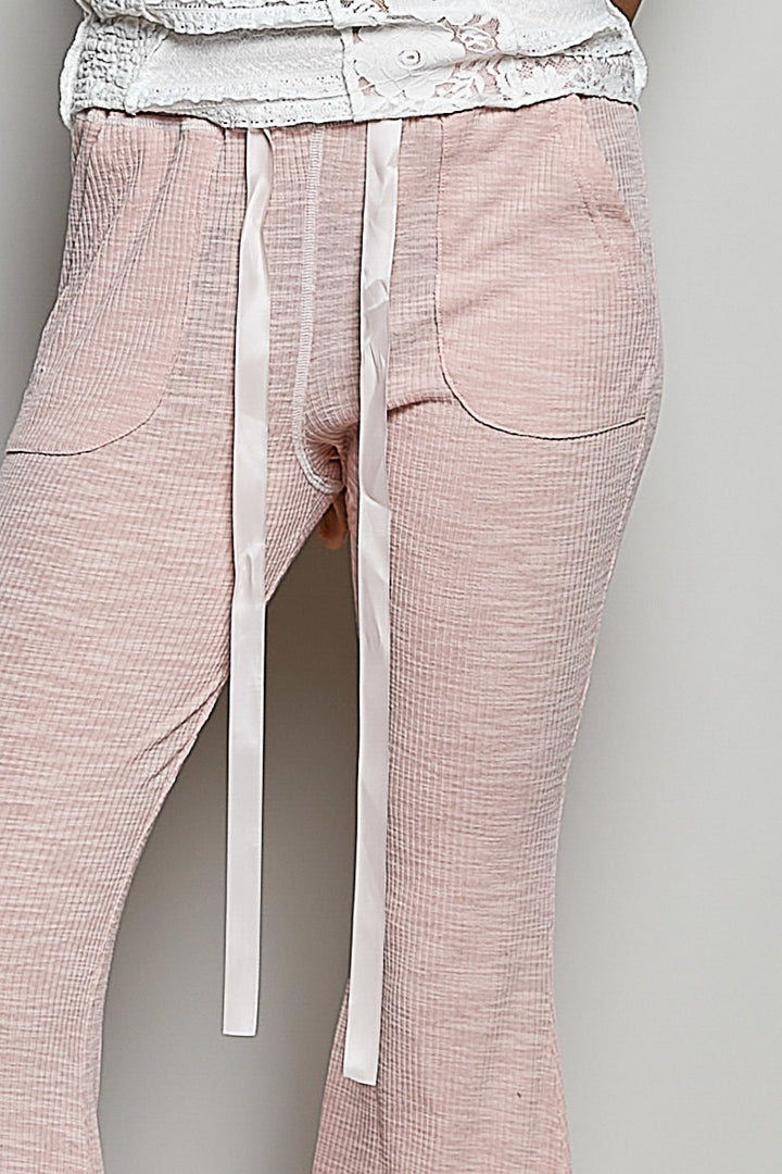 Textured ribbed knit flare pants with drawstring waist