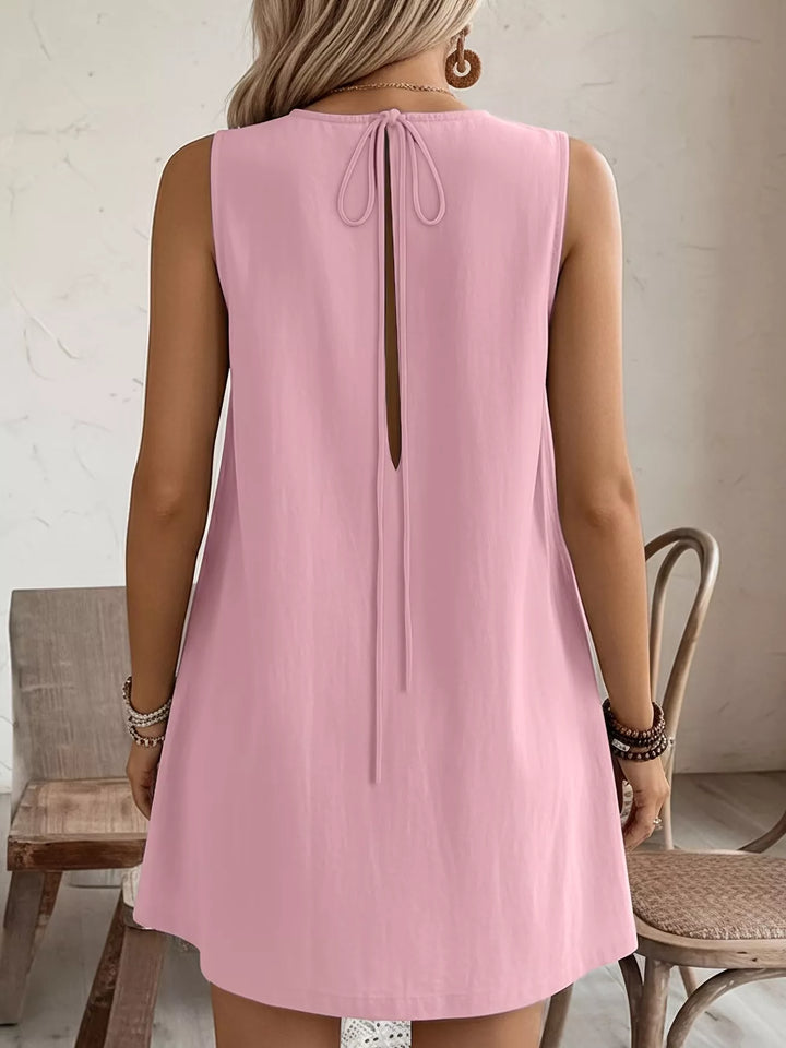 Ruffle-trim sleeveless mini dress with side pockets