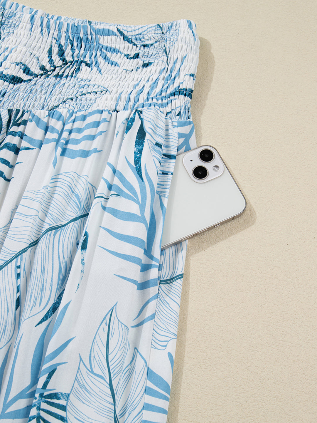 Tropical leaf print shirred-waist wide-leg pants